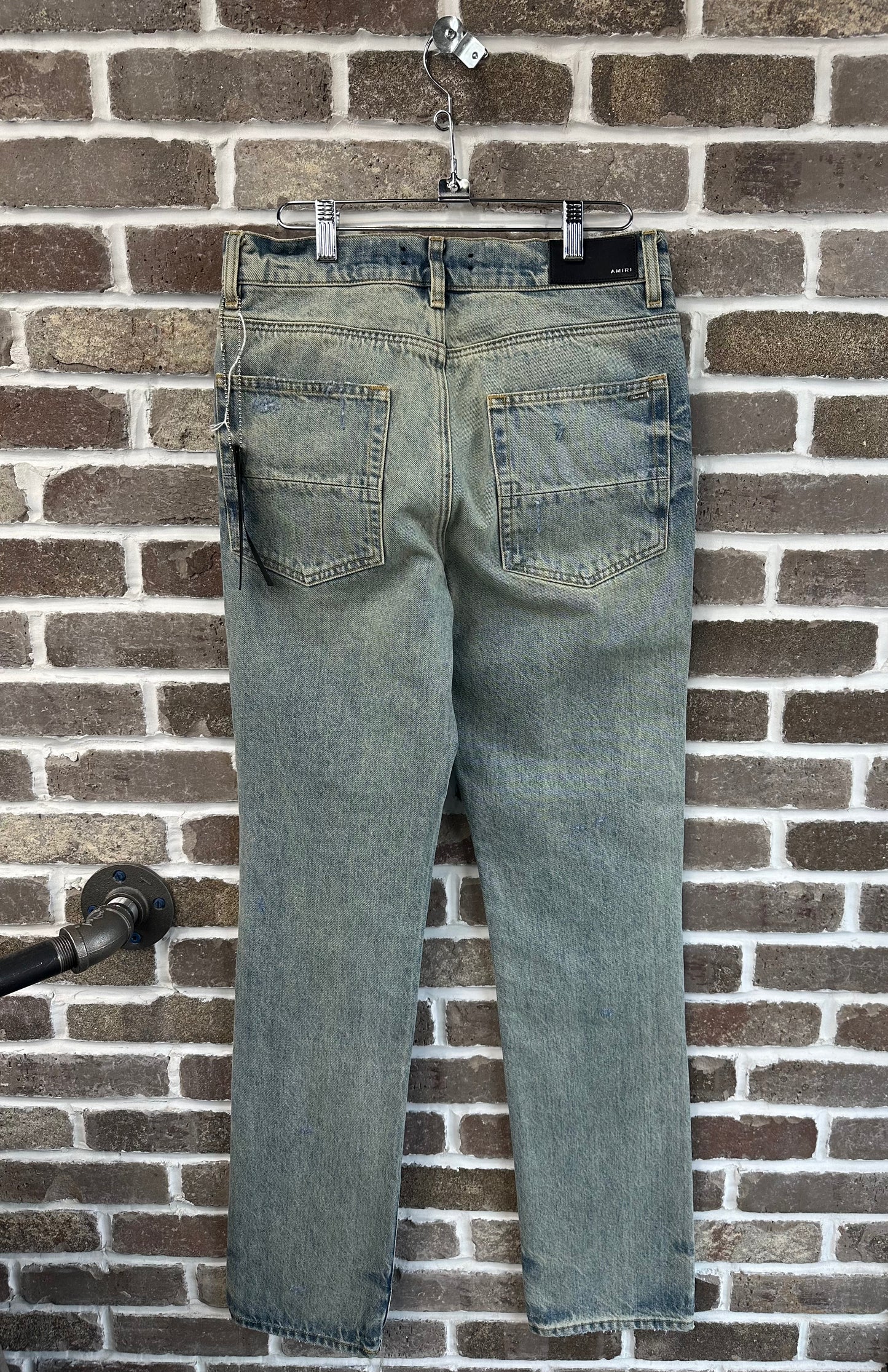 Amiri Straight Fit Ripped Denim Jeans