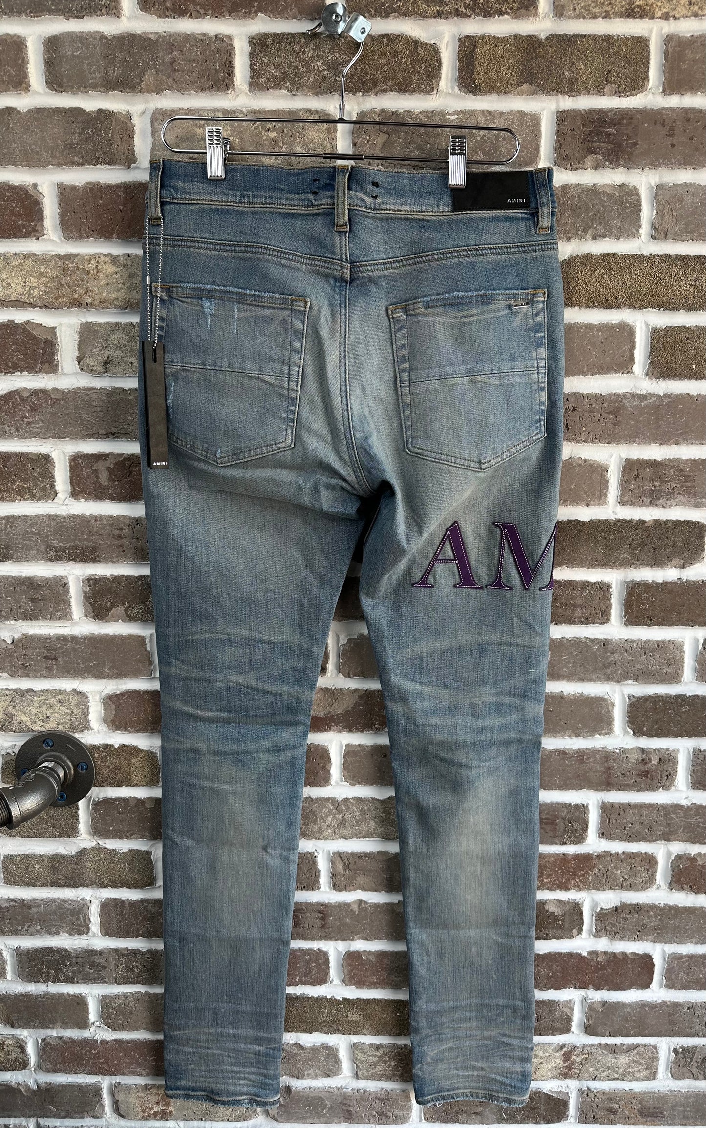 Amiri Light Wash Purple Serif Side Logo Jeans