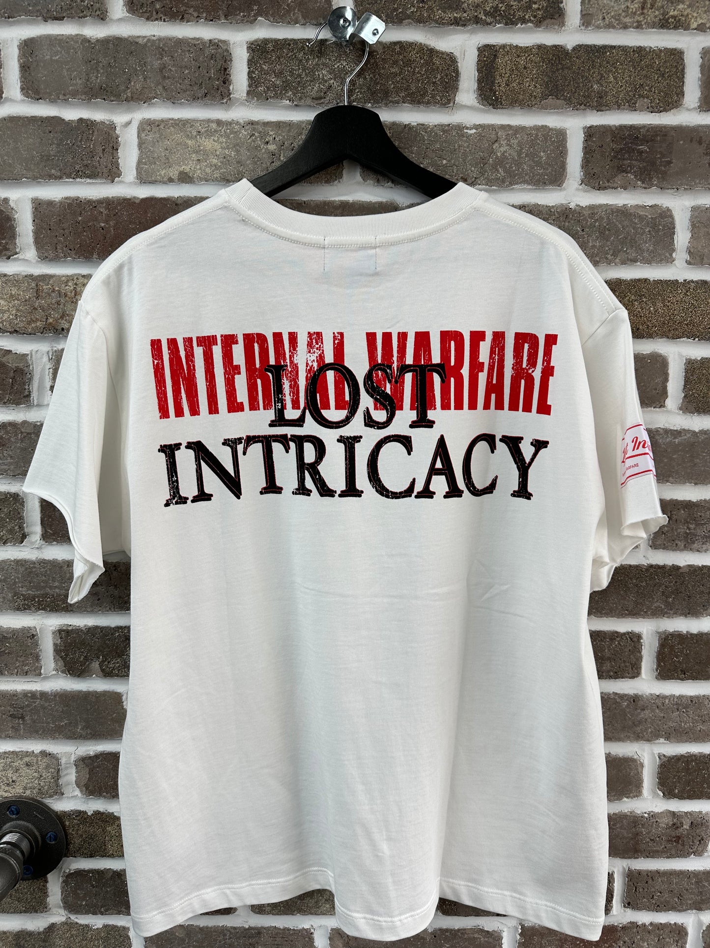 Lost Intricacy Front Page Mag Tee