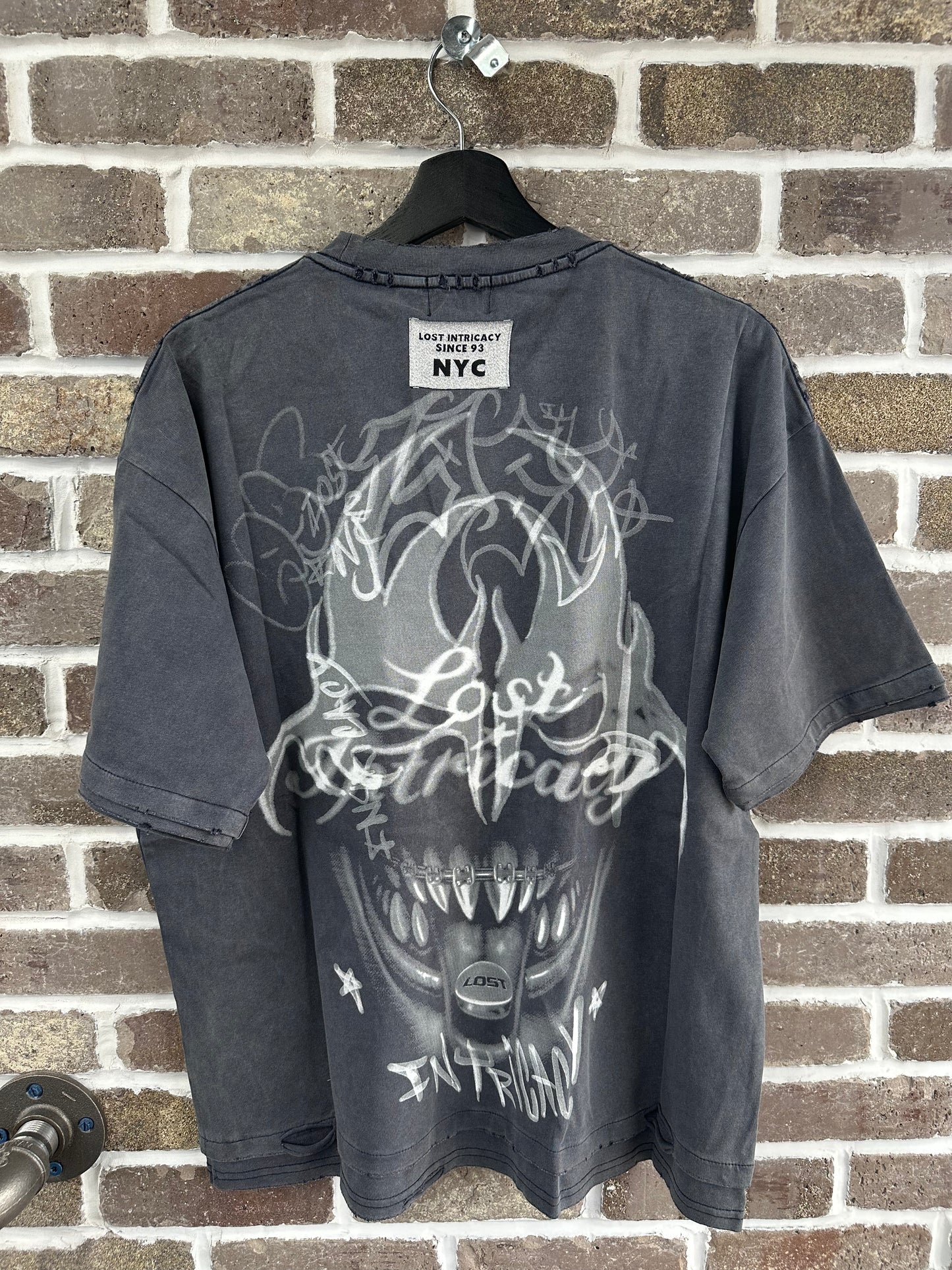 Lost Intricacy Twisted Signal Tee