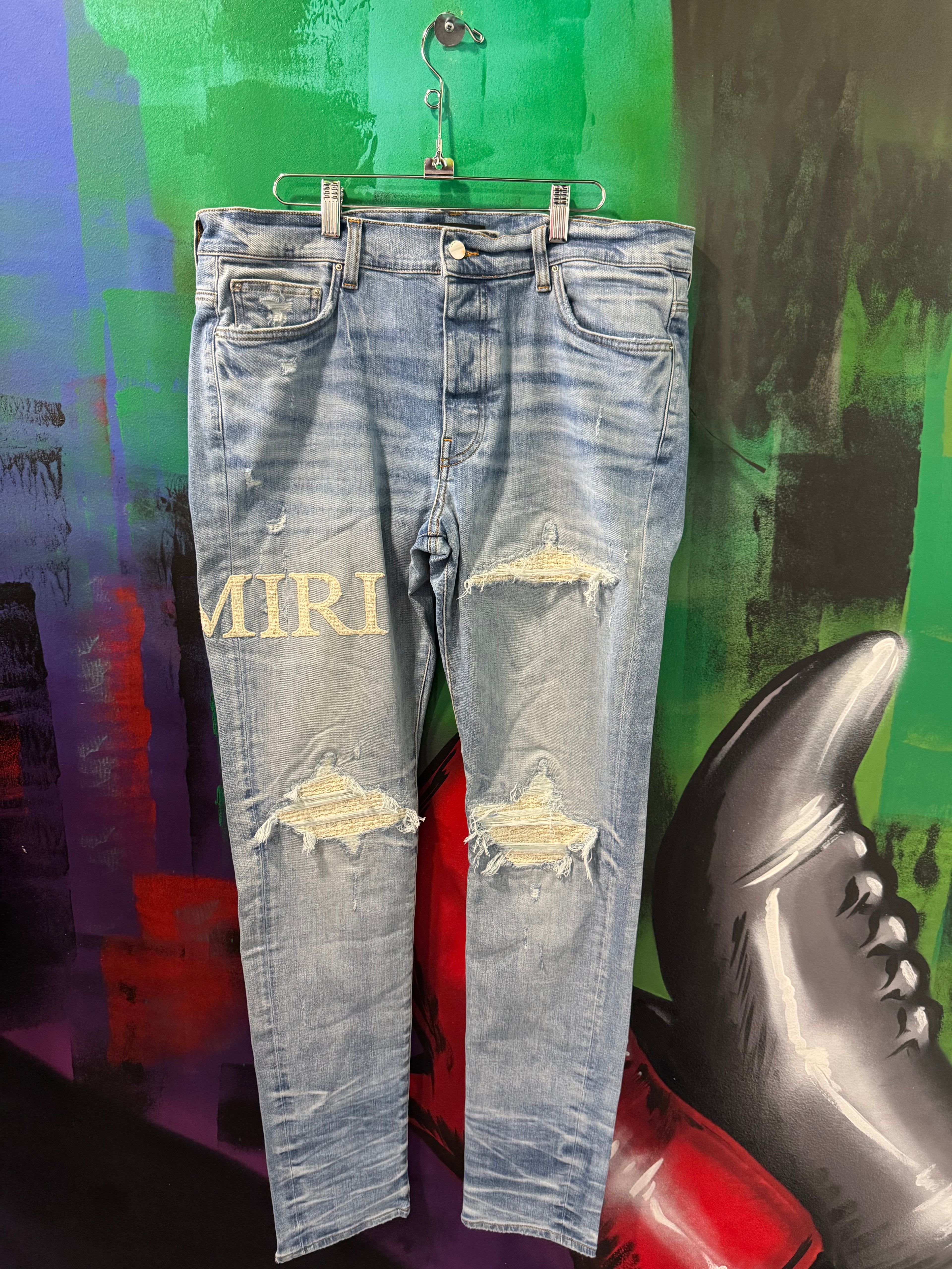 Amiri MX1 Boucle White Patch Light Wash Jeans