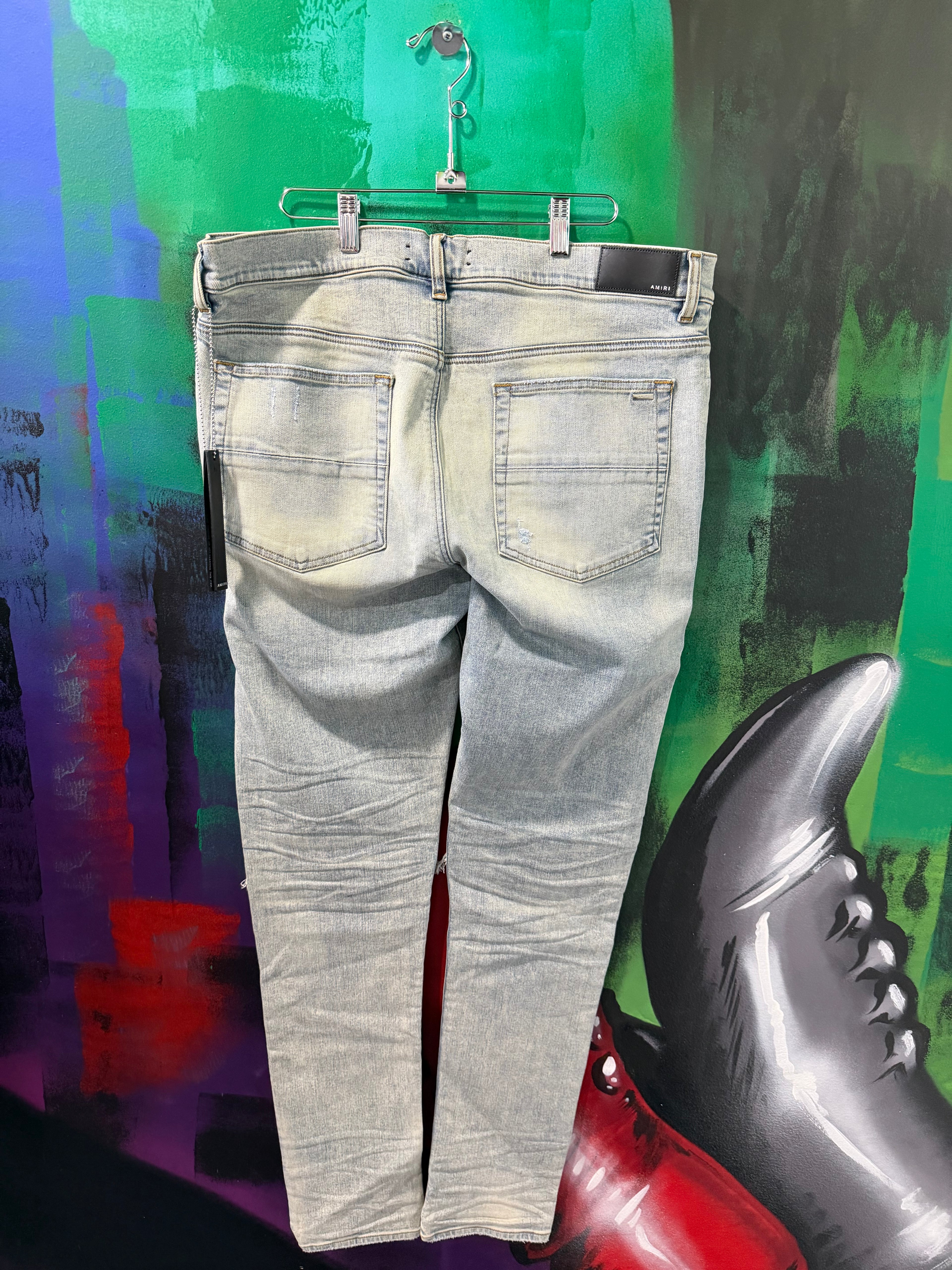 Amiri MX1 Yellow Patch Light Wash Blue Jeans