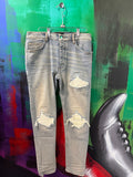 Amiri MX1 Light Wash & White Patch Jeans