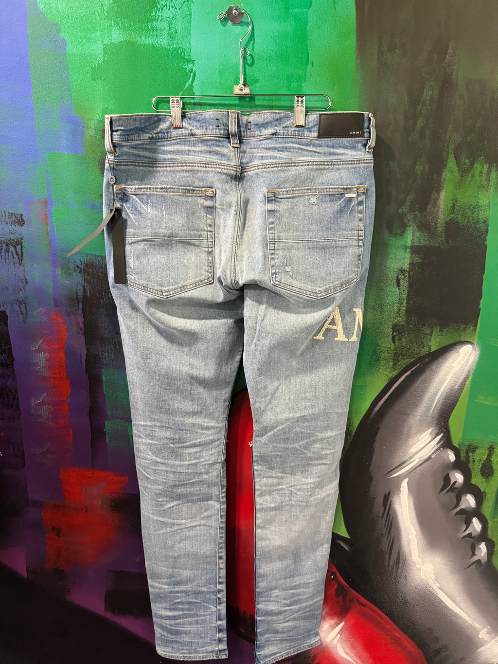 Amiri MX1 Boucle White Patch Light Wash Jeans