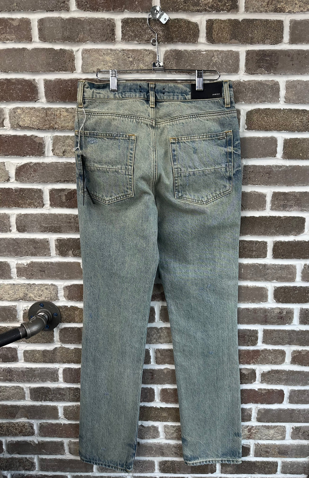 Amiri Straight Fit Ripped Denim Jeans
