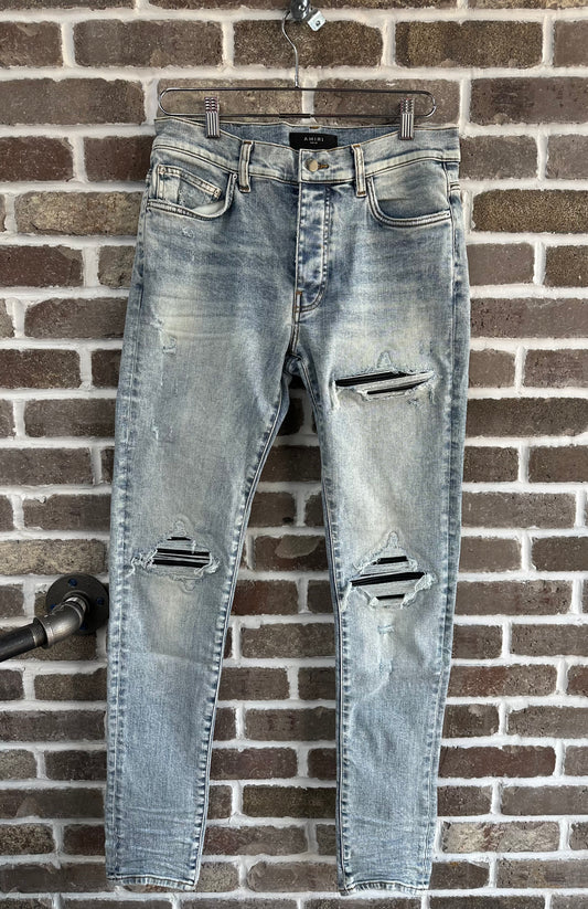 Amiri MX1 Light Wash Black Patch Jeans